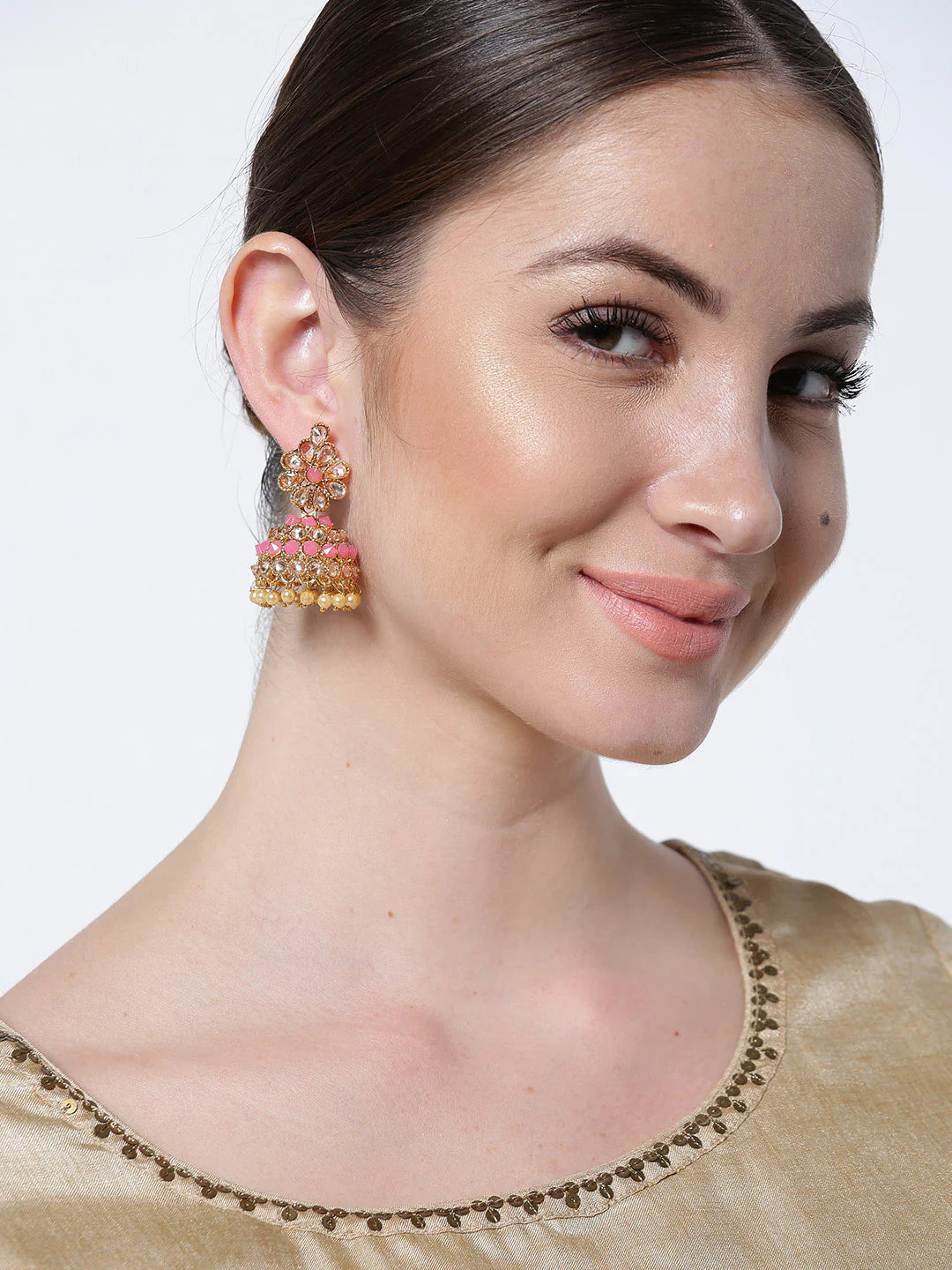 "Artificial Pink Gold-Plated Stones Studded Floral Patterned Jhumka Earrings for Women | Pink & White Traditional Ethnic Jewelry"
