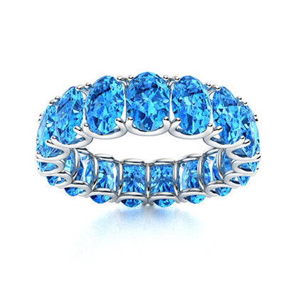 "Blue Topaz and Moissanite Wedding Ring for Women – Elegant 925 Sterling Silver Band with Diamond-Look Accents"